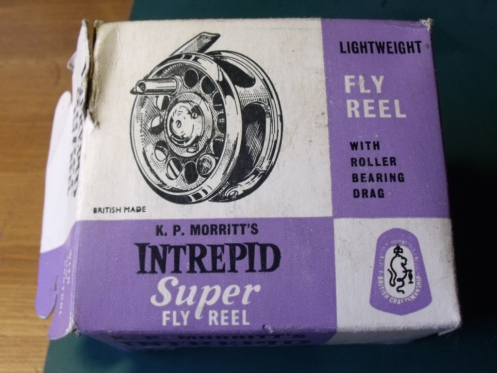 Box containing fishing reels to include Intrepid Super Fly Reel