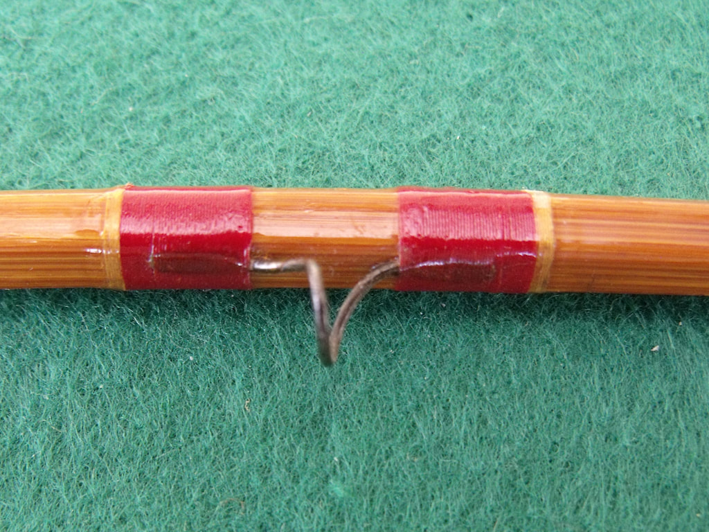 Split bamboo fishing rod by Harrocks & Ibbotson with reel