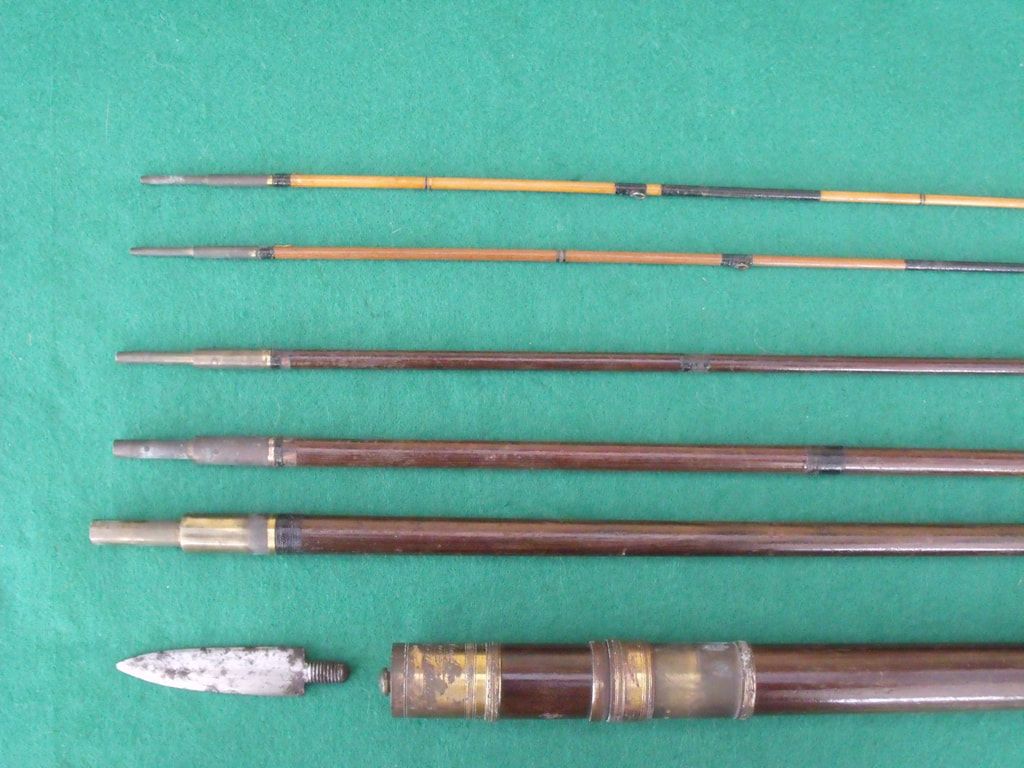 A quantity of vintage fishing rods, comprising: a greenheart 3